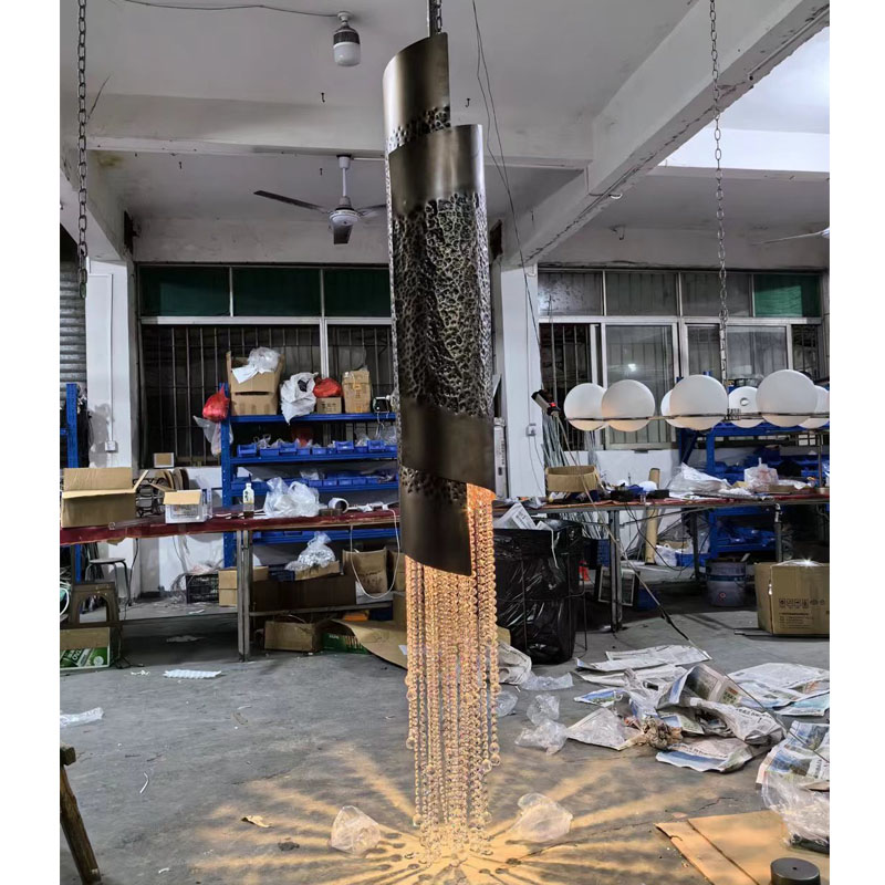 Circular stainless steel decorative lighting fixture for the hotel lobby