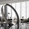 Circular stainless steel decorative lighting fixture for the hotel lobby